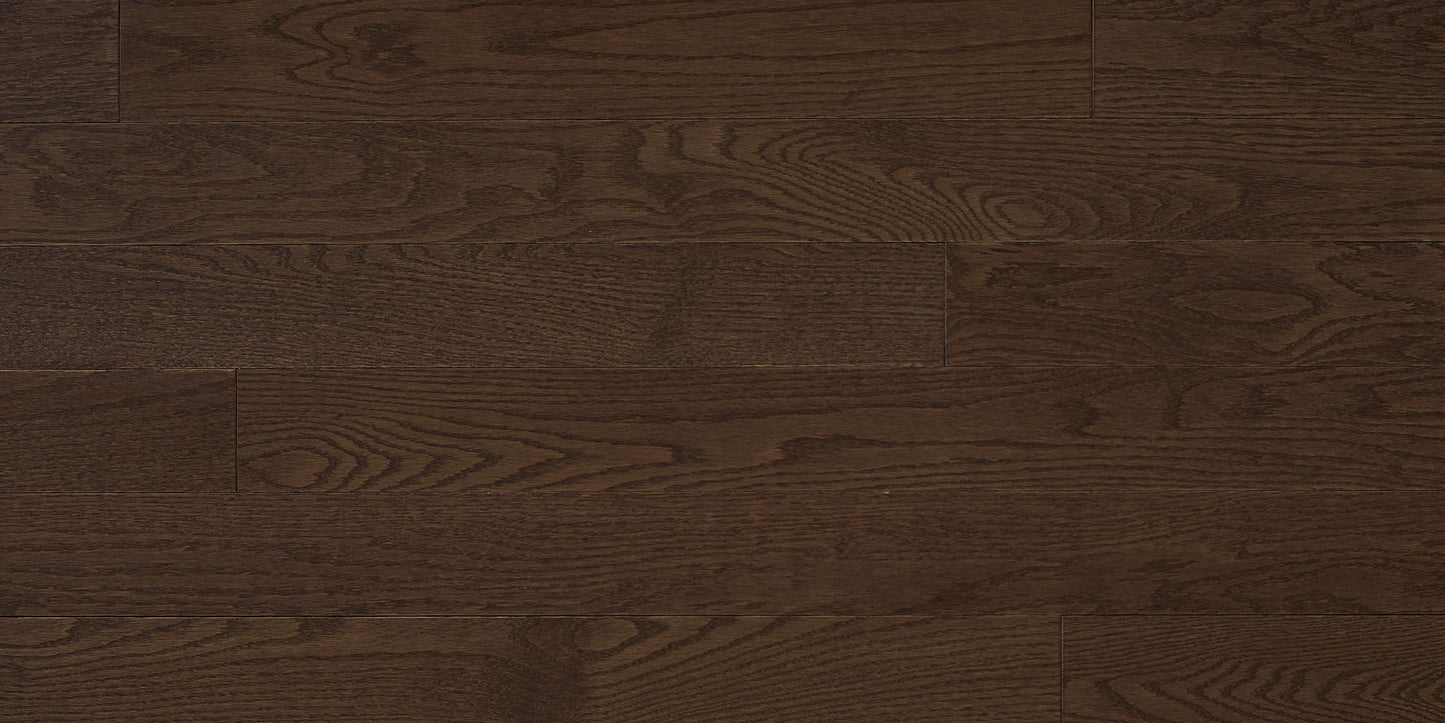 Close-up of dark brown wood flooring with visible grain and texture.