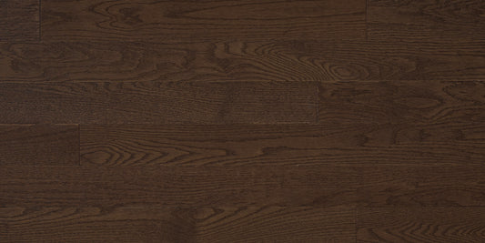 Close-up of dark brown wood flooring with visible grain and texture.